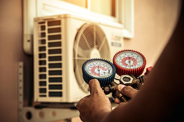 Professional Hvac Maintenance technician working in Center Point, TX